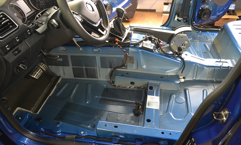Tuning the car in a pickup truck body with three layers of noise insulation on the floor, under the seats, doors and on the rear wall. Sound and vibration isolation using soft material with a car breakdown.